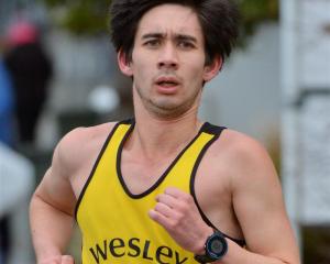 Tony Payne on his way to a win in the half marathon yesterday. Photo by Gerard O'Brien.