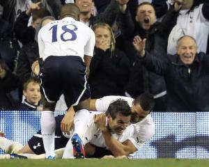 Tottenham Hotspur's Ryan Nelsen (C) celebrates his goal against Bolton Wanderers with Jake...