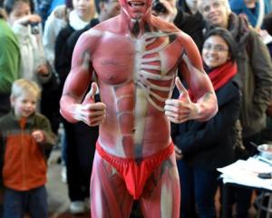 University of Otago masters anatomy student Zin Aung (25) gives the thumbs up after being body...