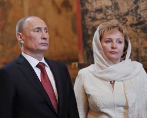 Vladimir Putin and his wife, Lyudmila, attend a service to mark the start of his term as Russia's...