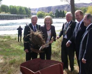 Waitaki MP Jacqui Dean, with the old 133-year-old, single-lane wooden bridge in the background,...