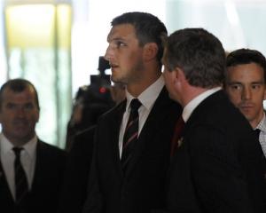 Wales captain Sam Warburton, centre, prepares to face a red card hearing in Auckland after being...