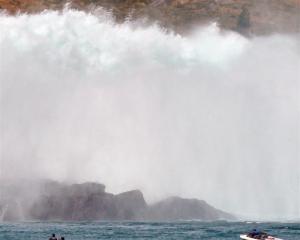 Water pours from the spillway of the Benmore dam at the head of the Waitaki Valley yesterday,...