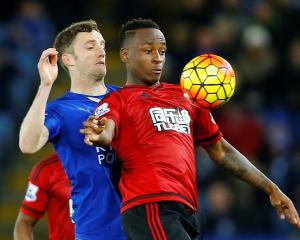 West Brom's Saido Berahino (R) in action with Leicester City's Andy King. Photo: Reuters