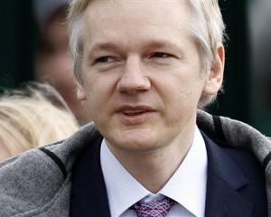 WikiLeaks founder Julian Assange arrives at Belmarsh Magistrates' Court in London. (AP Photo/Matt...