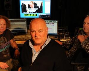 Working on the 100th episode of I Survived for A&E TV are (from left) NHNZ editor Mark Orton,...