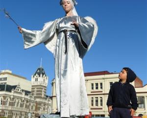 Zacharie Santana (3), of Dunedin, admires angel Natapiya Dryshchuk, of Christchurch, at the ...