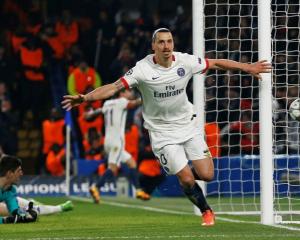 Zlatan Ibrahimovic celebrates after scoring the second goal for PSG against Chelsea. Photo: Reuters