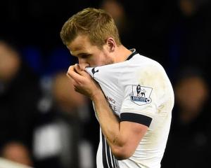 A dejected Harry Kane (Tottenham) leaves the field after the game. Photo Reuters