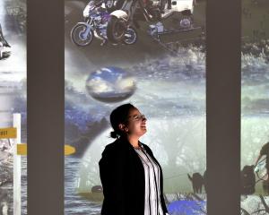 Otago Museum planetarium producer Oana Jones visits the museum’s  Beautiful Science Gallery,...