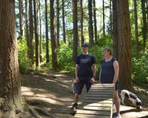 Mountain Biking Otago member Hamish Seaton and Mountain Biking Otago president Kristy Booth, and...