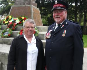 The Salvation Army's Ann and Bruce Heather beside the Hampden War Memorial. Photo: Shannon Gillies.