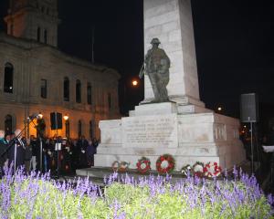 Waitaki deputy mayor Melanie Tavendale (left),  Waitaki MP Jacqui Dean and the RSA’s Ian Kofoed by Oamaru’s Great War Memorial. Photo: Shannon Gillies.