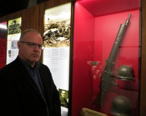 Toitu Otago Settlers Museum curator Sean Brosnahan believes the machine gun, used to devastating effect by German soldiers, was the decisive factor in the battles at Ypres and Passchendaele. Photo: Brenda Harwod