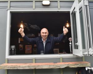 Dave Knox celebrates his ‘‘Man cave’’, which he paid $10,500 for at auction at the Great Kiwi...