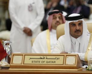 The Emir of Qatar Tamim bin Hamad al-Thani attends the final session of the South American-Arab Countries summit, in Riyadh. Photo: Reuters