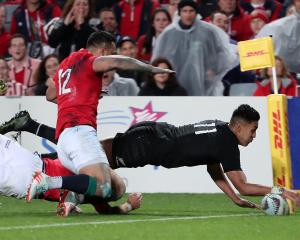  Rieko Ioane of the All Blacks scores a try. Photo: Reuters