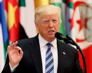 President Donald Trump delivers a speech during Arab-Islamic-American Summit in Riyadh, Saudi...