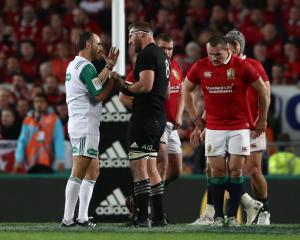 All Black captain Kieran Read remonstrates with referee Romain Poite after Poite awarded a scrum...