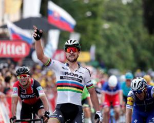 Bora-Hansgrohe rider Peter Sagan of Slovakia celebrates winning the third stage of the Tour de...