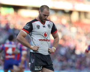 Simon Mannering of the Warriors looks dejected after losing to the Knights. Photo: Getty