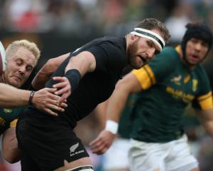 All Black captain Kieran Read offloads in the tackle during last years thumping victory over the...
