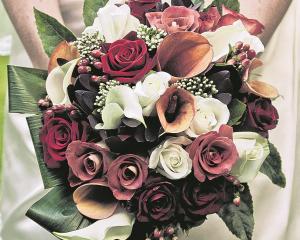 Sarah Davie's bridal bouquet for her marriage to Petros Nitis last year in the Orchard Gardens....
