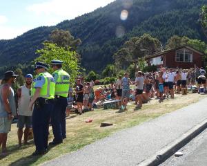 Queenstown police keep a close eye on Crate Day celebrations at Sunshine Bay on Saturday. PHOTO:...