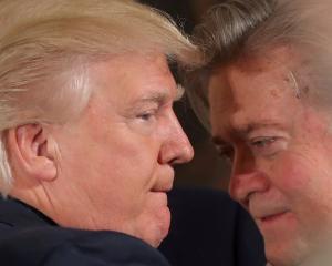 Donald Trump (left)  says Stephen Bannon had little to do with his presidential victory in 2016....