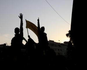  People gather to protest over high cost of living in Tehran, Iran. Photo: Getty Images