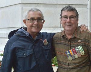 Australian Vietnam War veterans Jim Weston (left) and Pete Frost at yesterday’s dawn service at...