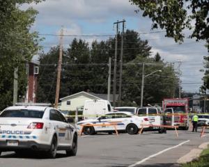 Police are present at the scene of a shooting incident in Fredericton. Photo: Reuters