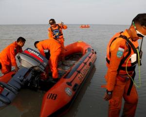 Rescue team prepares boat for Lion Air flight JT610 crash site off the coast of Karawang regency....