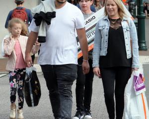 Shoppers in Dunedin's George St. Confidence in the retail sector was affected by a rise in the...