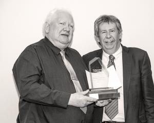 The Unsung Hero Award was presented to Bill Little by Deputy Commissioner Richard Thomson