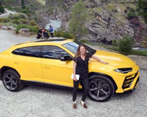 Motoring reporter Catherine Pattison takes a ride in a Lamborghini Urus. Photo: Stephen Jaquiery