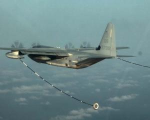 A KC-130 Hercules conducting air refuelling training over the Pacific Ocean. Photo: US Marine...