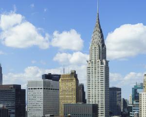 New York's iconic Chrysler Building (right) is to be put up for sale. Photo: Getty Images 