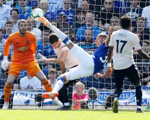 Everton's Richarlison scores their first goal. Photo: Action Images via Reuters