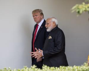 US President Donald Trump and Indian PM Narendra Modi speak during a bilateral meeting in...