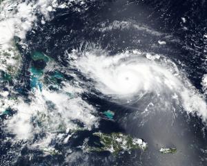 Hurricane Dorian approaches the coast of Florida in this NASA handout satellite image. Photo via...