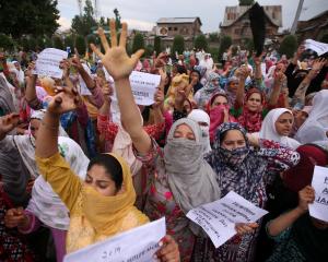 Kashmiri women shout slogans at a protest in Srinagar. Photo: Reuters