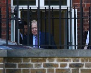 UK Prime Minister Boris Johnson is seen leaving Downing St following Brexit negotiations. Photo:...