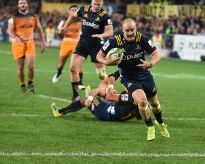 Matt Faddes scores under the posts against the Jaguares in a Super Rugby game at Forsyth Barr...