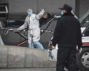 Chinese authorities say nearly 50 people are known to have been infected by the outbreak. Photo:...