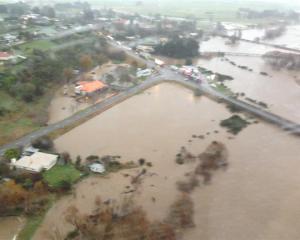 Traffic on SH 1 is stopped at Maheno just south of the Kakanui River bridge (centre right) when...