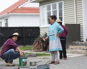 Getting ready to paint the fence on Piko Crescent, Riccarton.