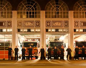 NZ Fire and Emergency crew members gathered outside Dunedin's Central Station to pay tribute this...