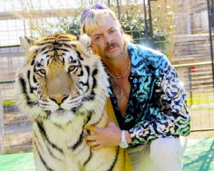 Joe Exotic, the eponymous Tiger King and one of his rugs in waiting. Photo: Supplied 
