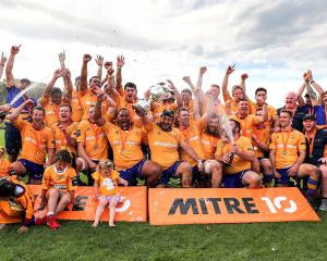 The North Otago team celebrates with the Meads Cup after beating Wanganui in the final at...